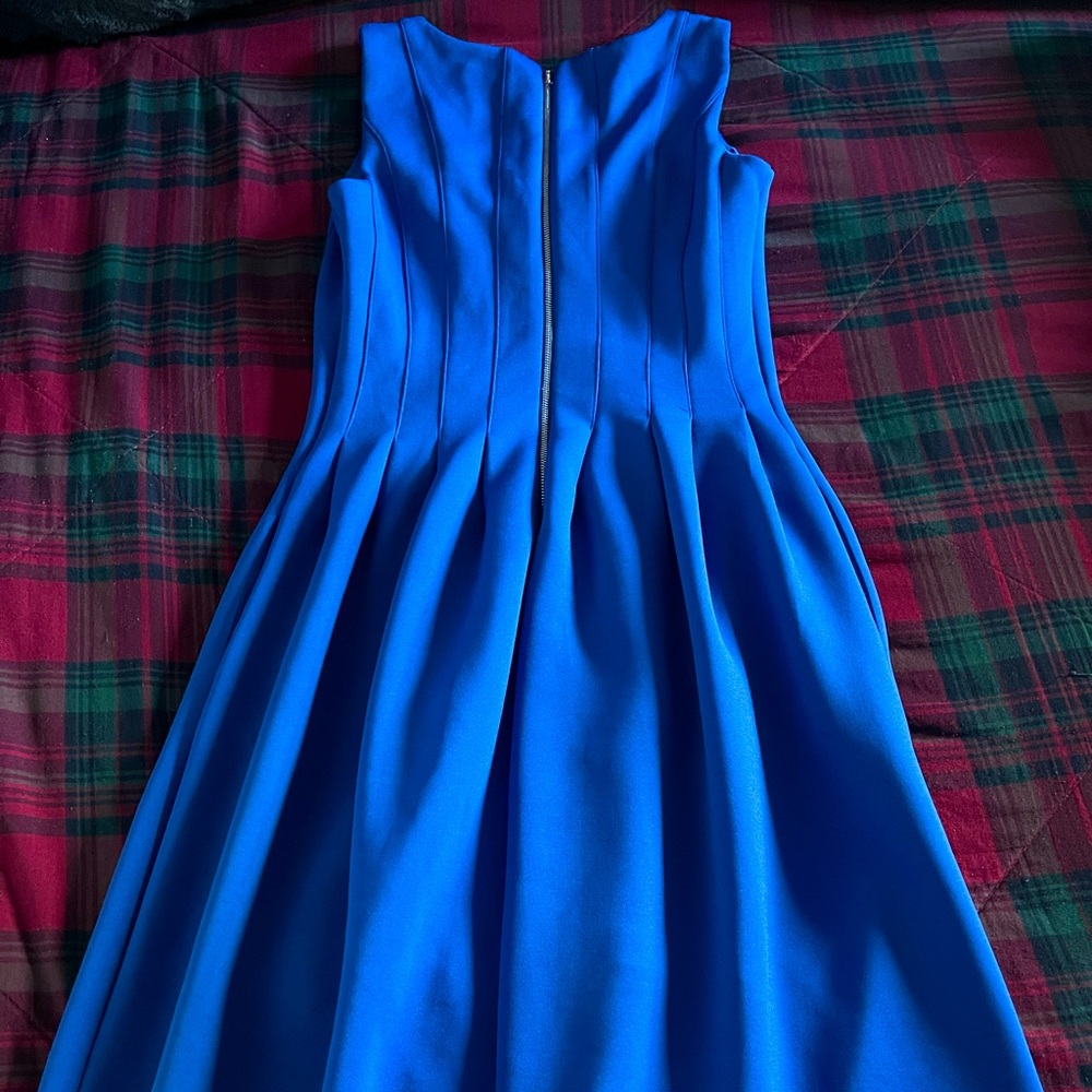 Dress suitable for party, church or any formal occasion.
